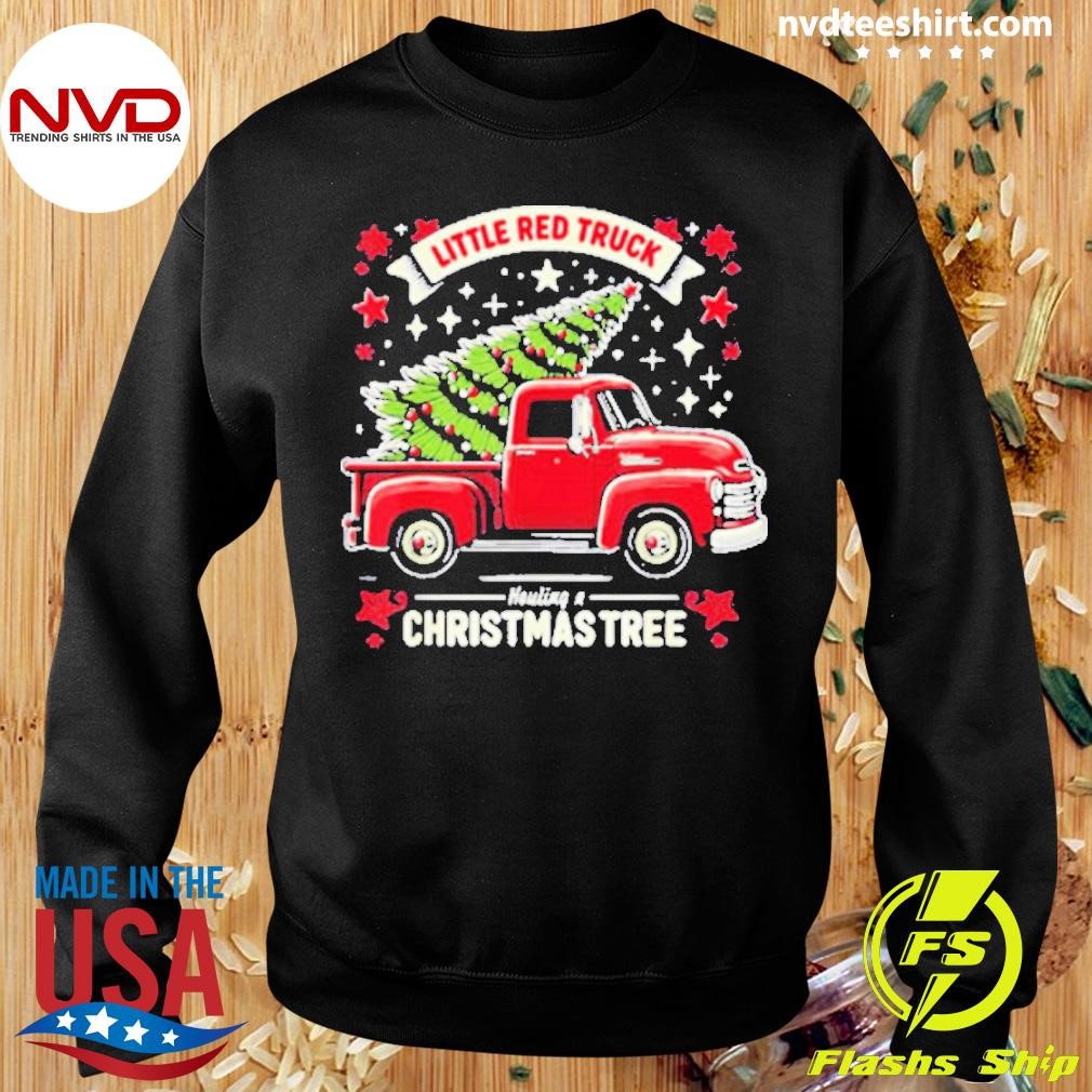 red truck with christmas tree shirt