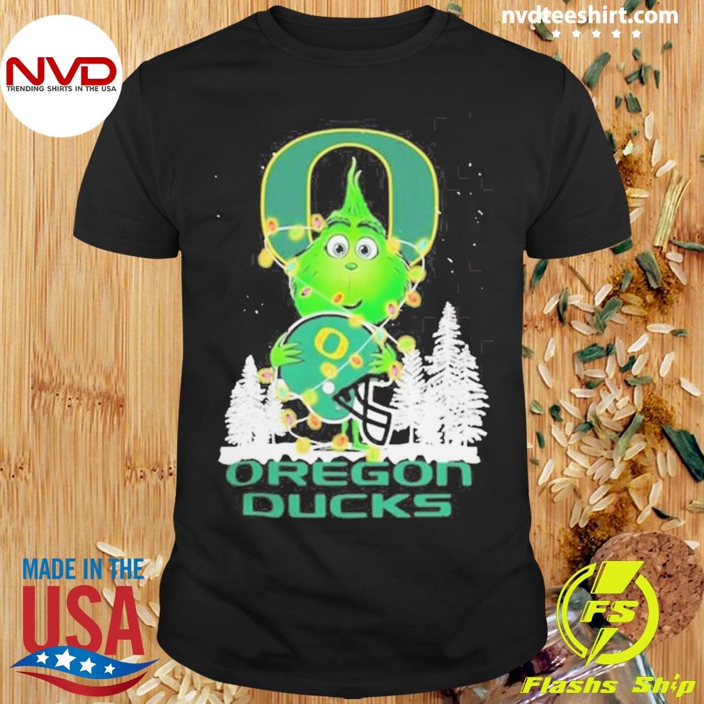 The Baby Grinch Hug Oregon Ducks Helmet Christmas 2024 Shirt