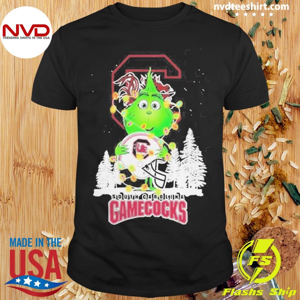 The Baby Grinch Hug South Carolina Gamecocks Helmet Christmas 2024 Shirt